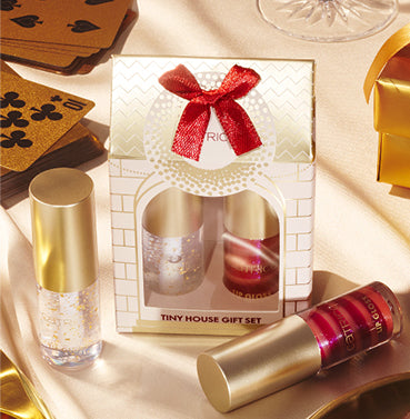 Meet Tiny House Gift Set. Two festive lip glosses inside!